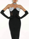 Backless Bandage Midi Dress featuring a strapless design, heart-shaped embellishments, and form-fitting silhouette in black.
