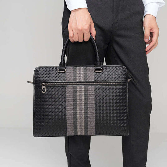Business casual briefcase in black, featuring woven texture and gray stripes, perfect for daily use.