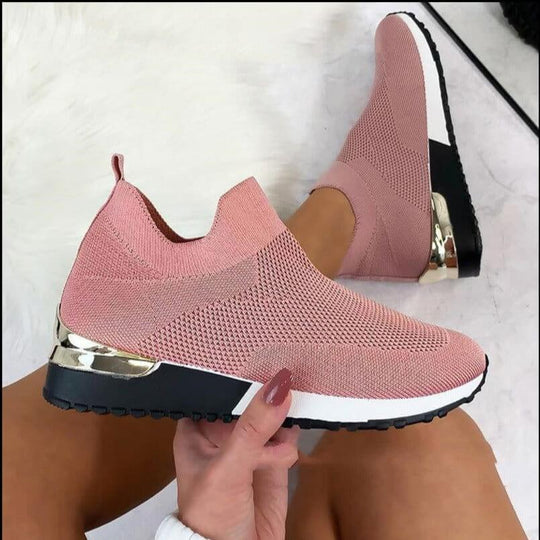 Stylish pink stretch cloth women's shoes with a flat heel and mesh design, perfect for casual wear.