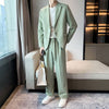 Slim fit men's suit jacket and pants in green, perfect for casual fashion in spring and autumn.