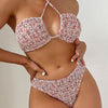 Stylish summer flowers print bikini set with pleated design, halter neck, perfect for beach fashion and comfortable wear.