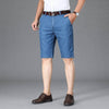 Men's light blue denim shorts, casual style, low waist, suitable for summer leisure wear.