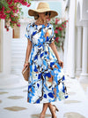 Printed Short-Sleeve A-Line Maxi Dress in vibrant blue and orange pattern, perfect for summer beach outings.