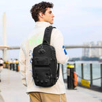 Man wearing a tactical chest outdoor messenger bag in black, ideal for sports and daily use.