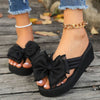 Thick-soled black herringbone sandals for women, featuring a round toe and large bow, perfect for summer casual wear.