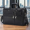 17-inch black leather laptop bag made of first layer cowhide, perfect for business travel and work.