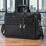 17-inch black leather laptop bag made of first layer cowhide, perfect for business travel and work.