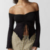 Black off-the-shoulder long sleeve top with ruched front, perfect for a stylish and sexy look.