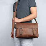 Vintage leather crossbody bag for men in brown, showcasing style and comfort, ideal for leisure travel.