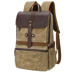 Waterproof batik canvas backpack with crazy horse leather, ideal for daily use and unisex; army green color.