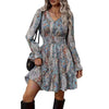 Woman wearing a Printed V-Neck Bell-Sleeve A-Line Midi Dress with bold print and flowy bell sleeves.