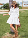 Woman wearing white Lace Solid-Colour Button Dress with hat and boots, styled for a casual day out in nature.