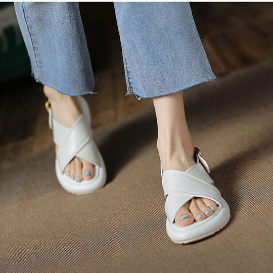 Women's stylish white cross Roman sandals with non-slip sole, perfect for beach wear and casual outings.