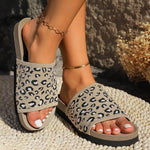 Women's casual leopard-print slippers with a stylish design, perfect for leisure wear and comfortable walking.