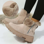 Women's short snow boots in beige, featuring plush lining, zipper detail, and thick rubber sole for winter comfort.