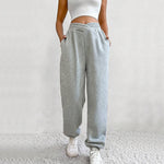 Casual gray high waist velvet pants for women, featuring ankle ties and a comfortable fit.